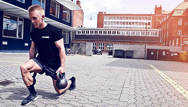 Walking kettlebell lunges