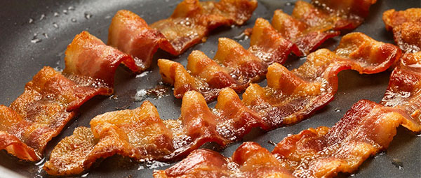 Er bacon ligeså farligt som rygning?